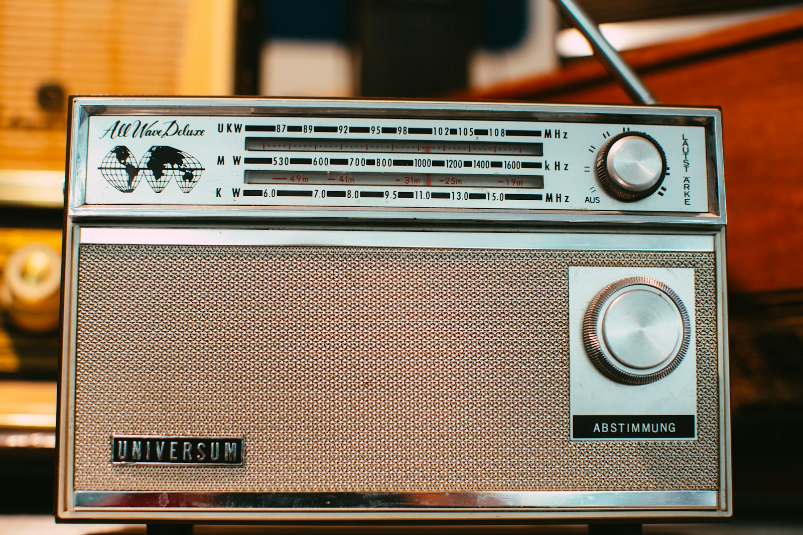 an old radio sitting on top of a table